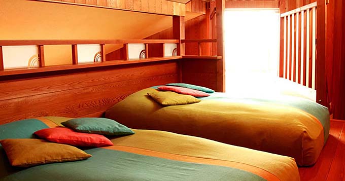 宇川温泉 よし野の里 客室ベット画像